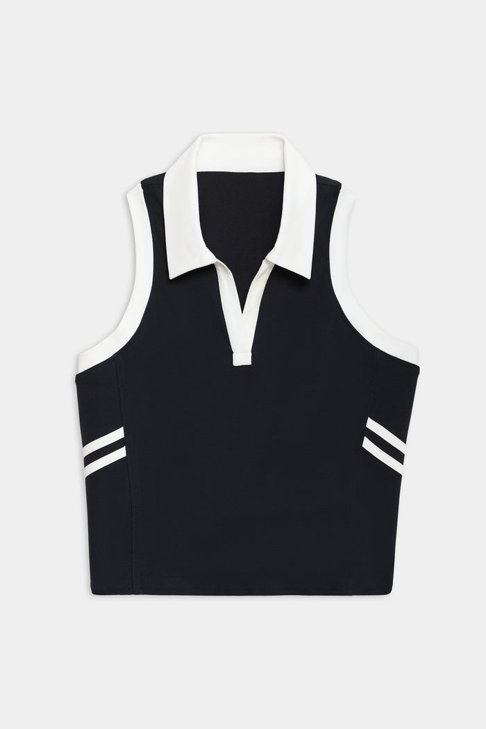 The SPLITS59 Austin Airweight Crop Polo is a sleeveless black top with a white collar, V-neck, and two white stripes near the hem on each side.
