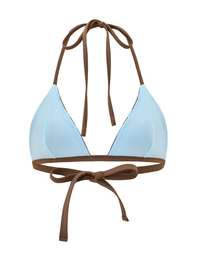 The CITRINE BIKINI TOP - BLUE CHECK by TIGERMIST is a light blue check halter bikini top with brown contrast straps, featuring neck and back ties for adjustable fit. Shown on a plain white background.