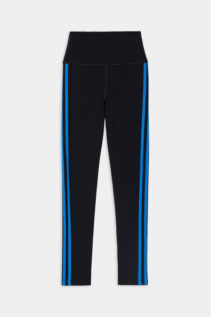 The SPLITS59 Ella High Waist Airweight 7/8 leggings in Black/Classic Blue are made from butter-soft fabric, feature two classic blue vertical stripes along each leg, and are shown flat on a white background—ideal for hot yoga and everyday comfort.