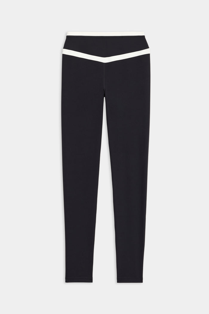 SPLITS59 Mason High Waist Rigor Full Length leggings in black and white feature a white V-shaped waistband detail, shown laid flat on a white background.