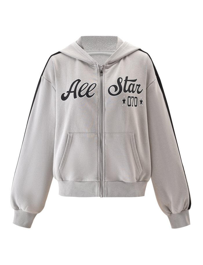 The PAYTON HOODIE - STONE by TIGERMIST is a lightweight terry, vintage-inspired zip-up hoodie in light gray with black "All Star 070" text, star graphics, front pockets, a hood, and bold black sleeve stripes.