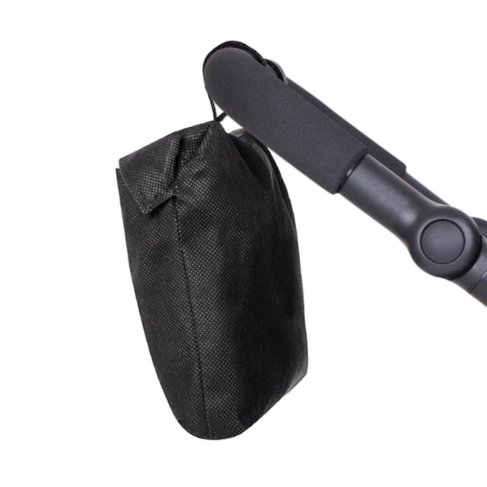 Black fabric bag hanging from stroller handle on phil&teds sport verso baby strollers