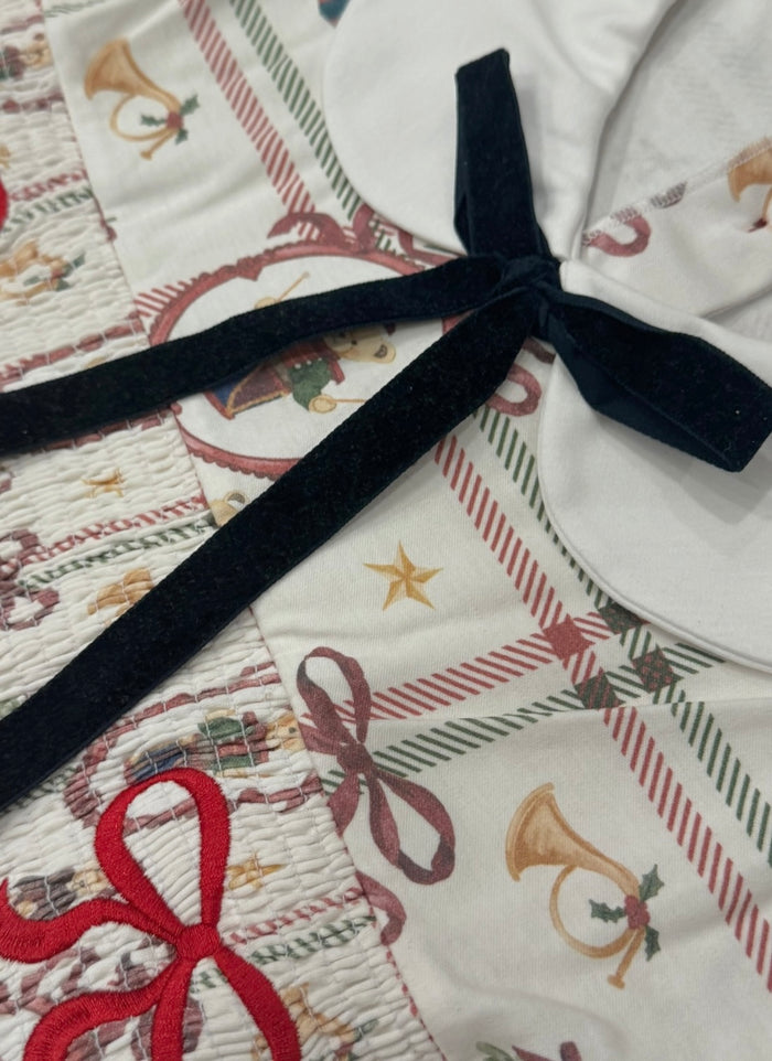 Close-up of rounded white collar and black velvet bow on Xmas Festive Bears Mom Gown