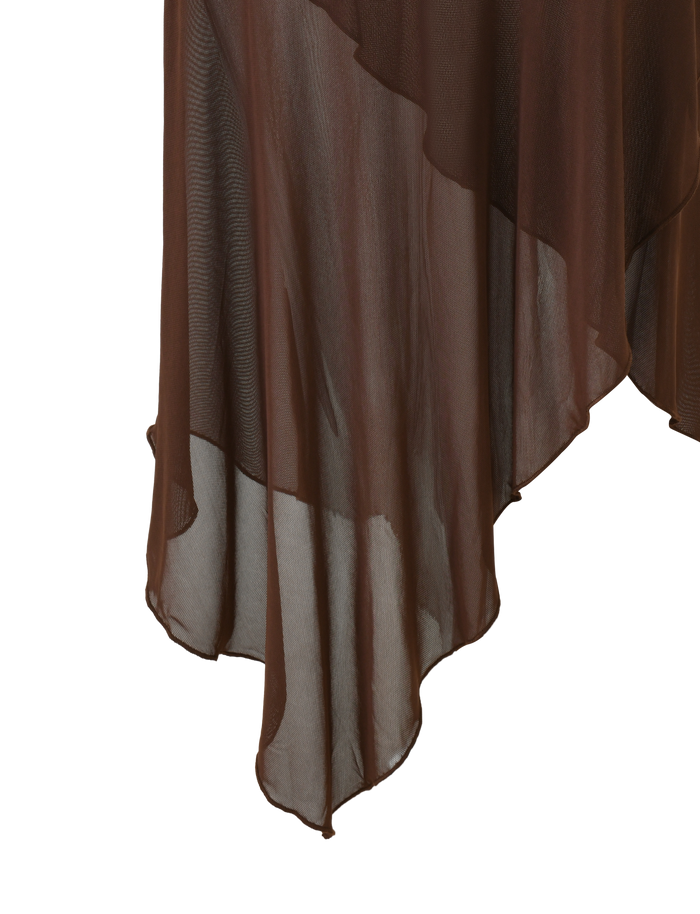 The TIGERMIST ZINNIA MIDI SKIRT in chocolate features a sheer, asymmetrical flowing hem, layered draping, and a textured stretch knit waistband for an elegant look against a white background.