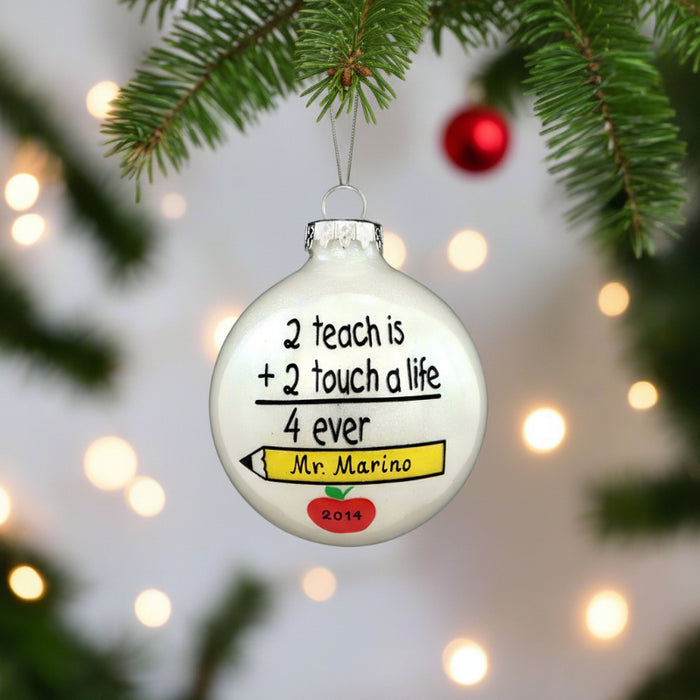 2 teach is  touch a life glass ornament