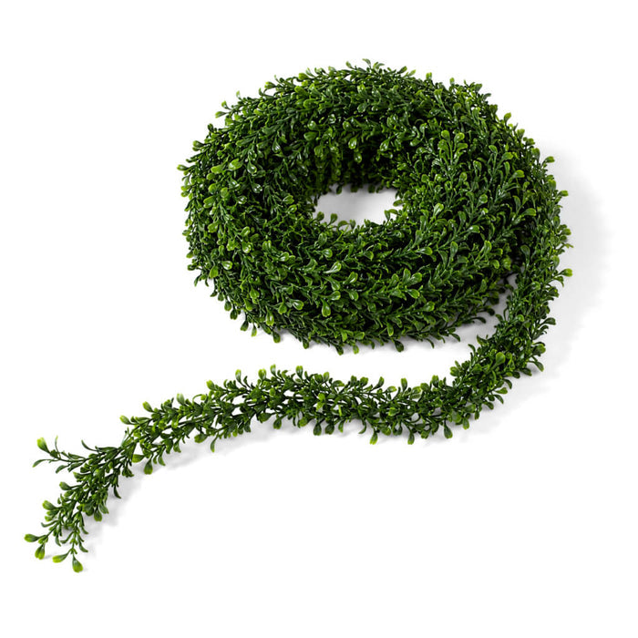 9ft faux boxwood garland coiled against a clean white background