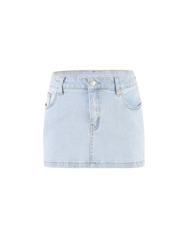 The AMAYA MINI SKIRT - BLUE: LIGHT WASH from TIGERMIST is displayed, showcasing a front button and zipper closure. It features two front pockets and two back pockets. The skirt is crafted from traditional denim fabric with visible stitching, exuding a casual, classic design.