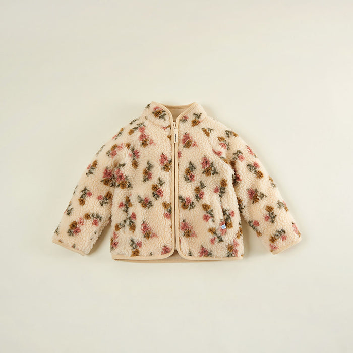Flat lay of the Amber print sherpa zippered jacket