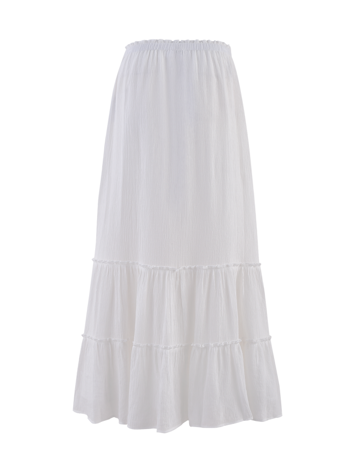 The ASHLYNN MAXI SKIRT - WHITE from TIGERMIST features two flowy tiers, an elasticated waist, a slightly crinkled texture, and full lining. This ankle-length piece is crafted from lightweight fabric for versatile, stylish comfort.