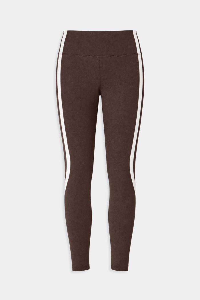 SPLITS59 Bianca High Waist Rigor 7/8 leggings in Dark Chocolate/White, made from a spandex-nylon blend with white curved side stripes, are shown flat on a plain white background.