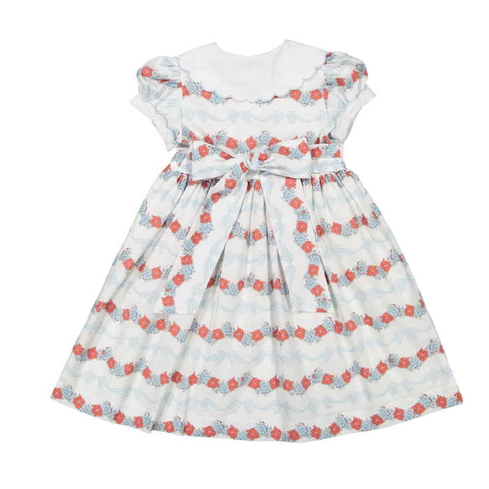 Back view of Breeze Floral and Bows Dress with coordinating coral trim