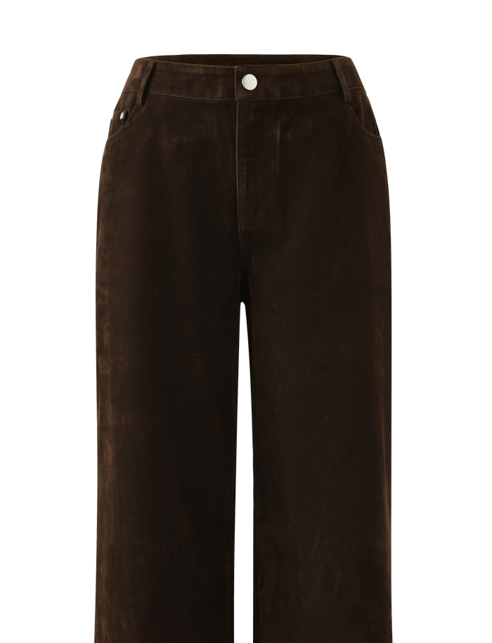 The TIGERMIST CAMELLIA PANT - CHOCOLATE SUEDE features a high waist, wide-leg silhouette, vintage-inspired details, front button and zip closure, two side pockets, and belt loops in a rich chocolate suede finish.