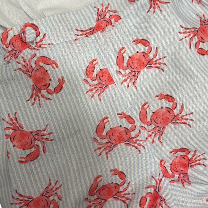 Close-up of red crab print on coordinating shorts