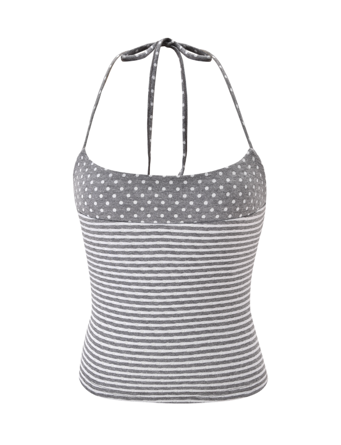 The DASHIELL TOP by TIGERMIST is a heather grey rib knit halter with adjustable neck ties, featuring white polka dots above contrast stripes.