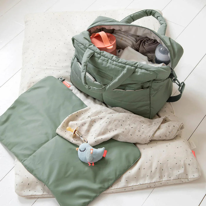 Sage green deer quilted changing bag with exterior zip closure and interior insulated pocket