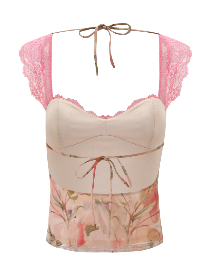 The TIGERMIST DUNE TOP - WATERCOLOUR FLORAL is a sleeveless, light pink lace top with cap sleeves, sheer panels, adjustable tie back, and delicate neck tie, shown against a white background.