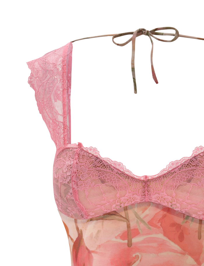 A close-up of the TIGERMIST DUNE TOP - WATERCOLOUR FLORAL, featuring a pink lace-trimmed sheer design with cap sleeves and an adjustable tie back, displayed on a white background.