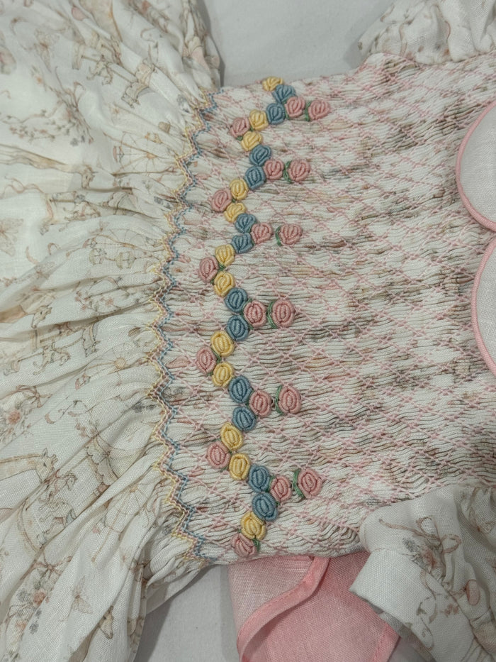 Close-up of colorful handsmocking on Ella Pastels Carousel Dress