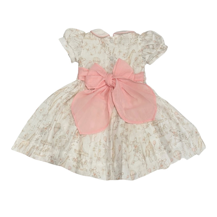 Back view of Ella Pastels Carousel Dress with oversized pink bow