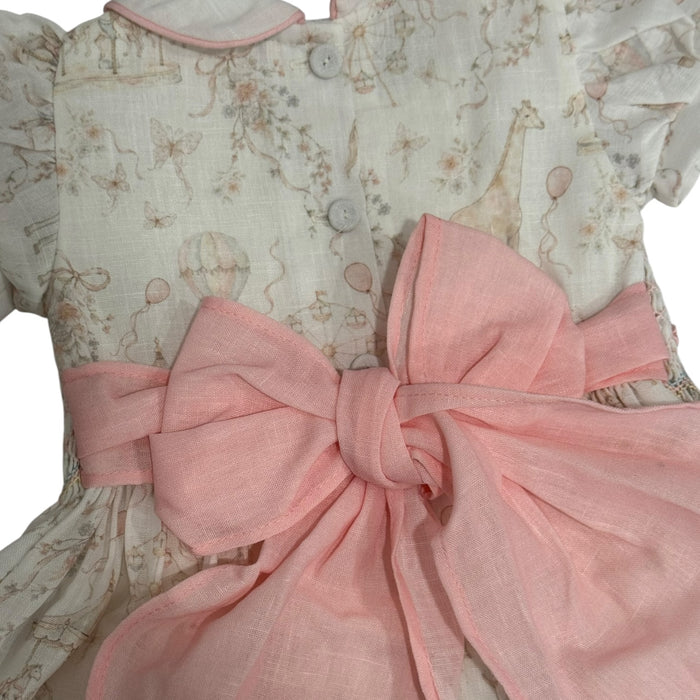 Close-up of oversized pink back bow on Ella Pastels Carousel Dress