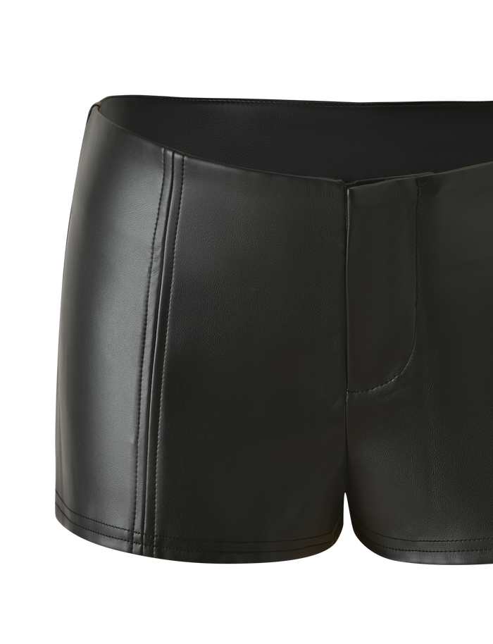 The EMERALD SHORT - BLACK by TIGERMIST features black faux leather in a mid-rise, mini fit with a smooth texture, visible seam details, and a sleek, fitted design. Photographed against a plain white background.