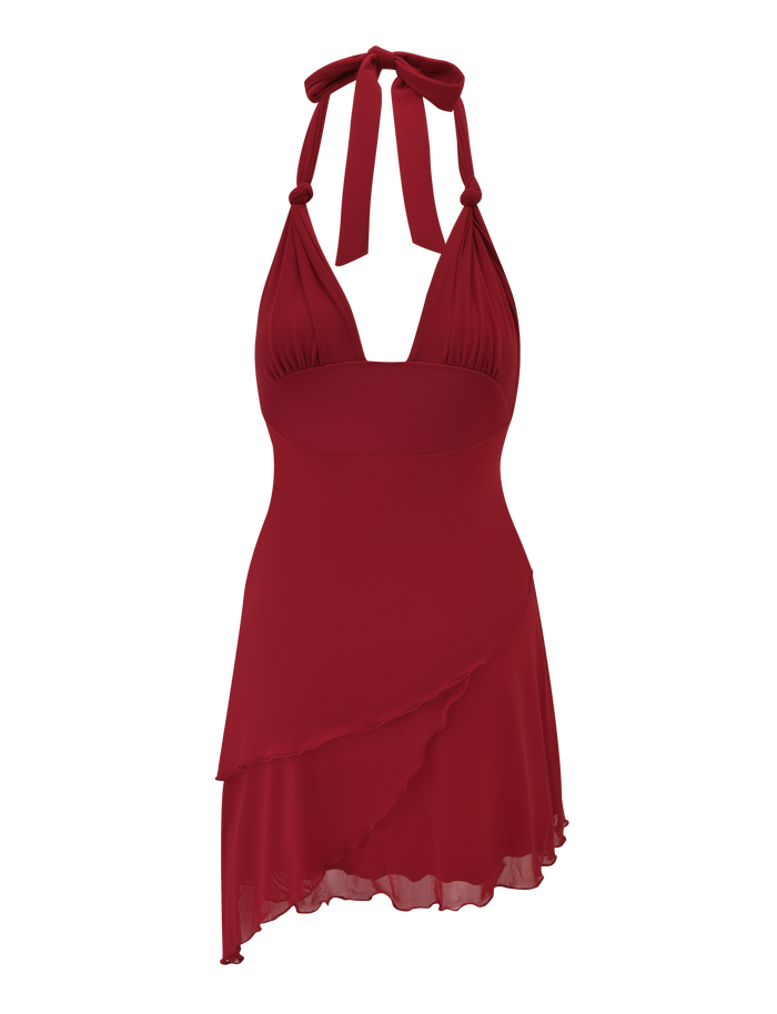 The FRIEDA MINI DRESS - RED by TIGERMIST is a sleeveless halter mini dress with a V-neckline, fitted bodice, layered asymmetrical hem, neck tie, and soft, flowing fabric for an elegant look.