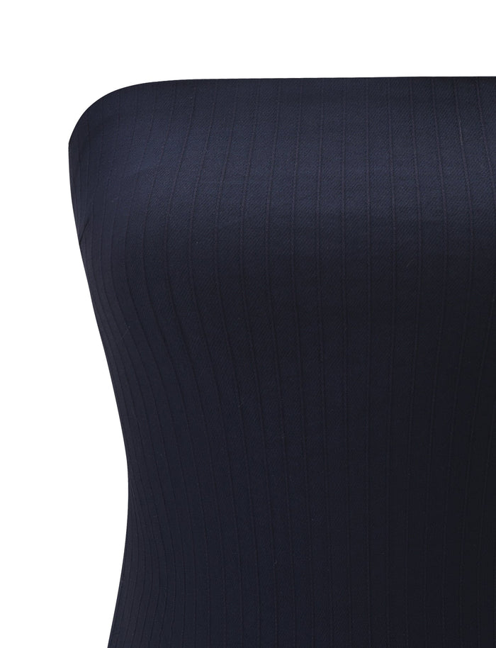 Close-up of the TIGERMIST GWENDOLINE TOP in navy, showcasing its ribbed, strapless design with vertical textured stripes and a sleek, form-fitting silhouette against a white background.