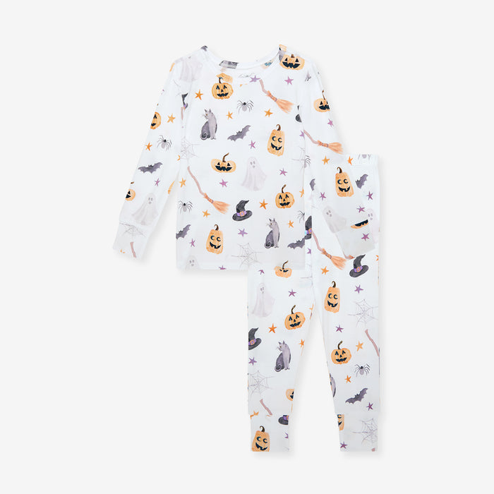Posh Peanut Irving Classic Pajama Set laid flat, showing the long-sleeve top and pants in the scattered Halloween-icon print.