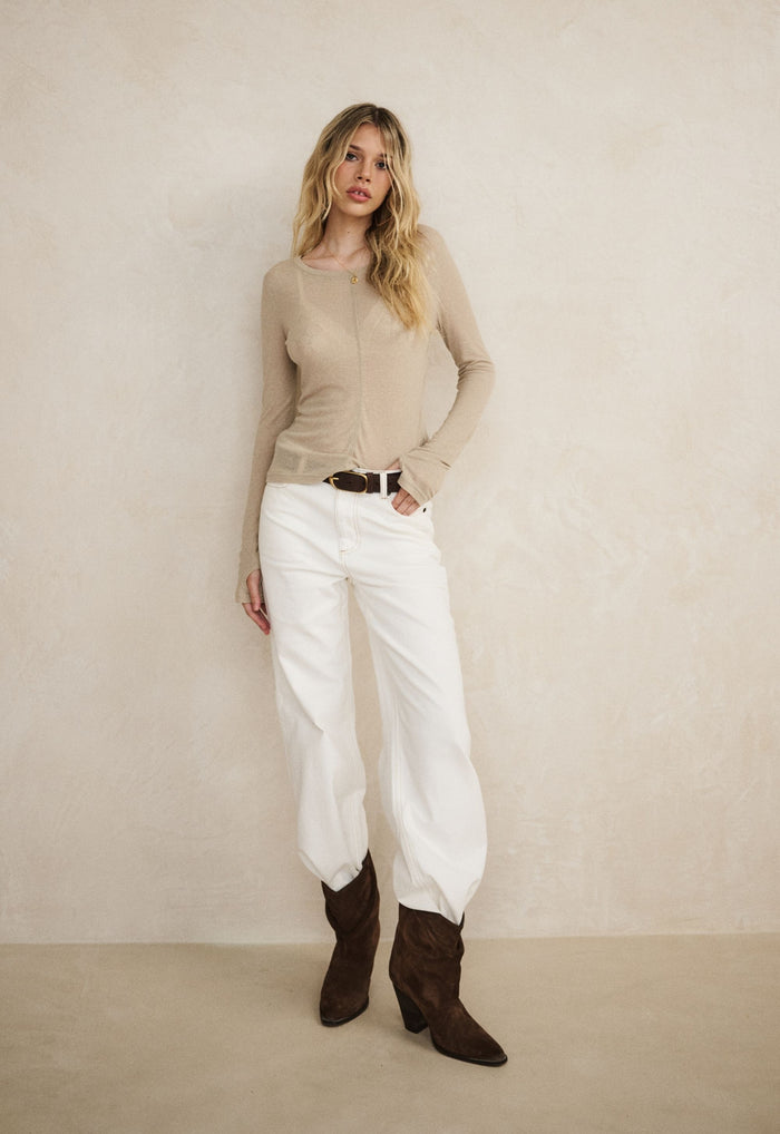 Model wearing Isabella 2.0 Long Sleeve Tee in Stone, front view, lyocell-hemp blend with centre panel seam