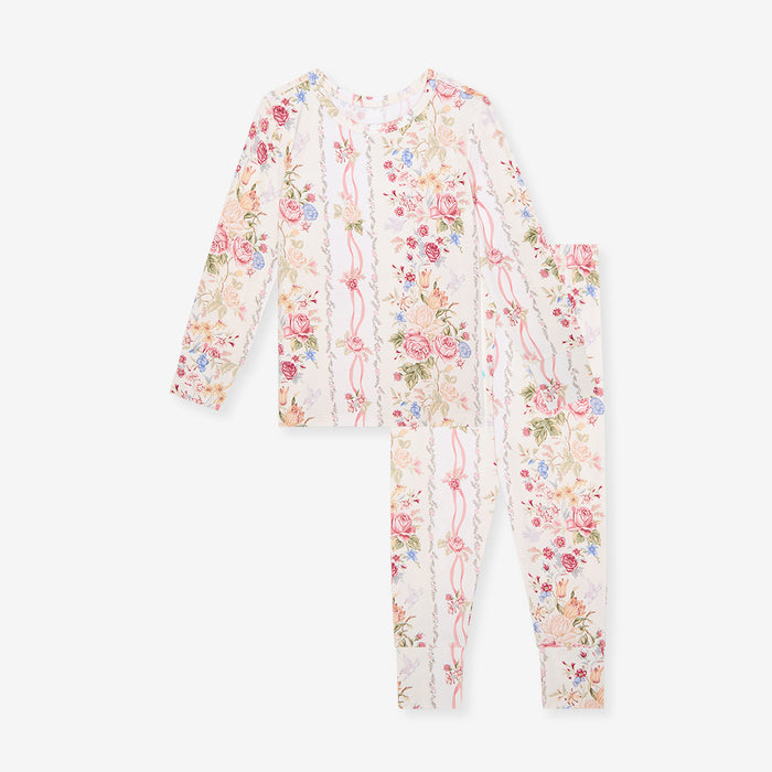 Flat lay of the Janey print classic pajama set, long-sleeve top and pants, on a white background