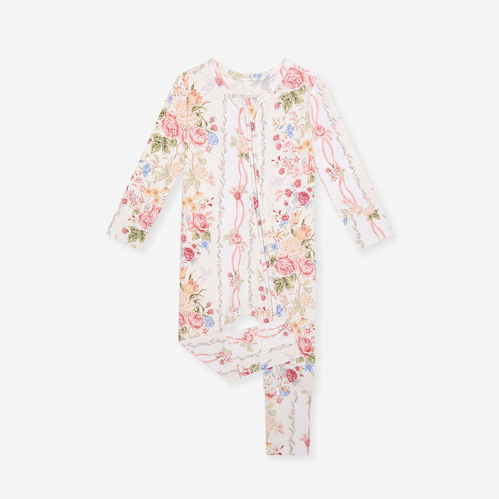 Flat lay of the Janey print convertible one-piece, a vintage floral with pink roses, blue flowers, and ribbon stripes
