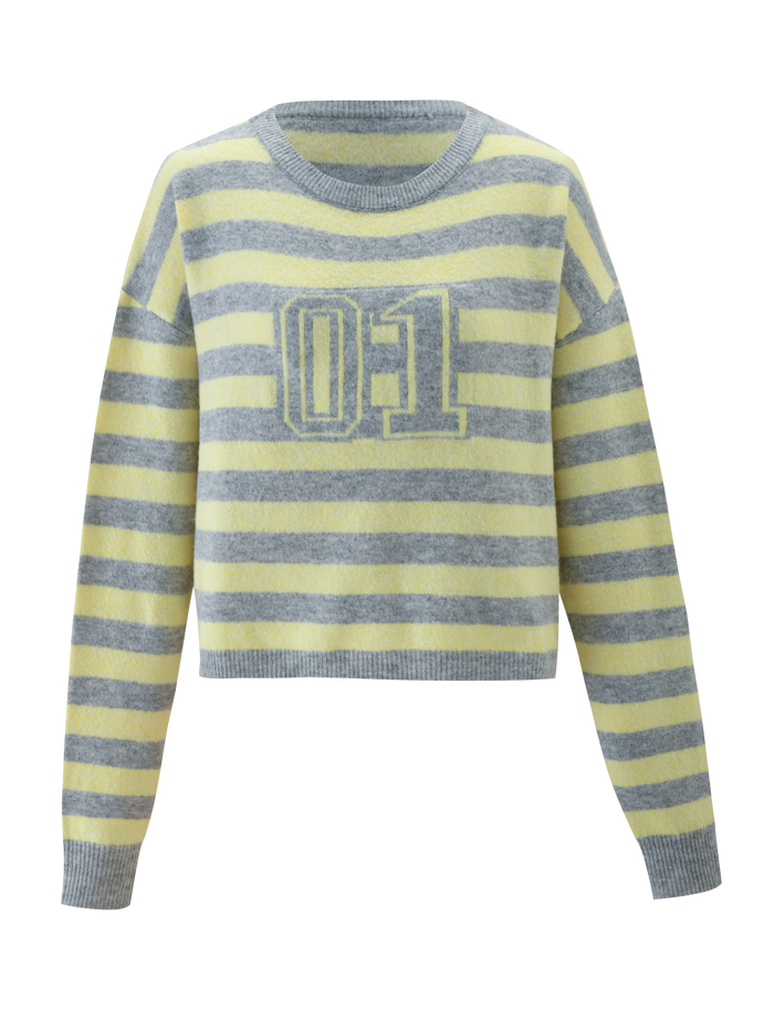 The KOA JUMPER by TIGERMIST is a knit sweater with an oversized fit, featuring yellow and gray stripes, a bold "01" print on the front, and solid gray trim on the collar, cuffs, and hem.