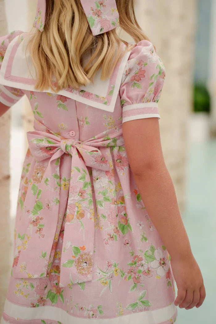 Back view of girl wearing Linen Floral Sailor Dress