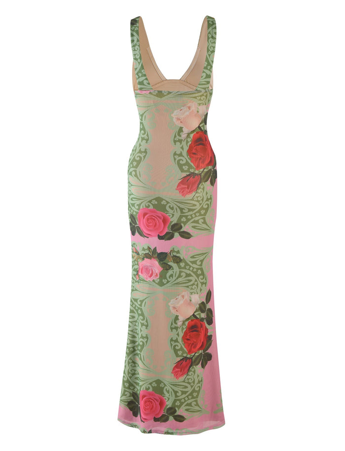Introducing the LUNARIA DRESS - MULTI : MACRO FLORAL : SUMMER ROSE by TIGERMIST, a stunning long, sleeveless gown featuring a deep V neckline. This elegant dress boasts a soft beige top that seamlessly transitions into a green and pink patterned bottom, adorned with large red and pink roses and green leaves. The overall design is both sophisticated and visually captivating.