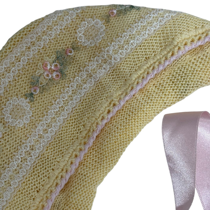 Close-up of delicate lace and knit detailing on Aida Yellow and Pink Floral Set
