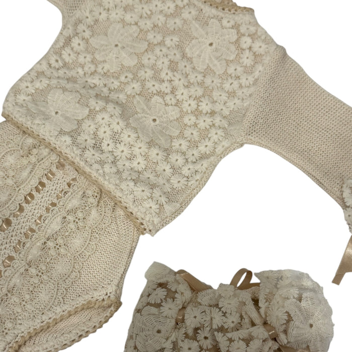 Close-up of ivory lace and knitted detailing on Judith II Beige and Camel Set