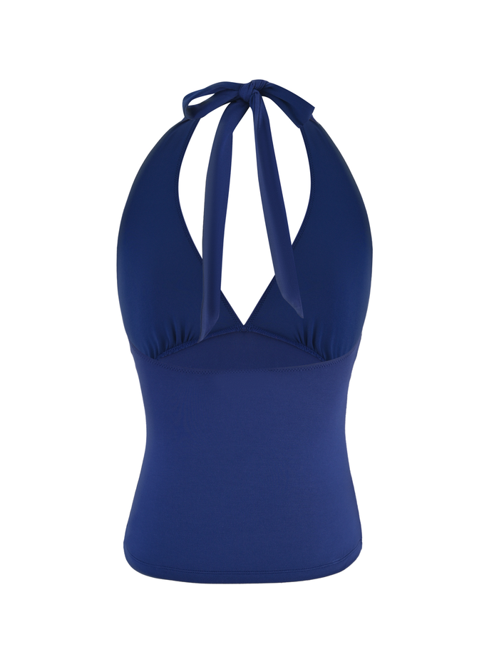 The MERIAL TOP - DENIM BLUE by TIGERMIST is a sleeveless, stretchy halter top with a V-neckline, neck tie closure, and fitted bust and waist.