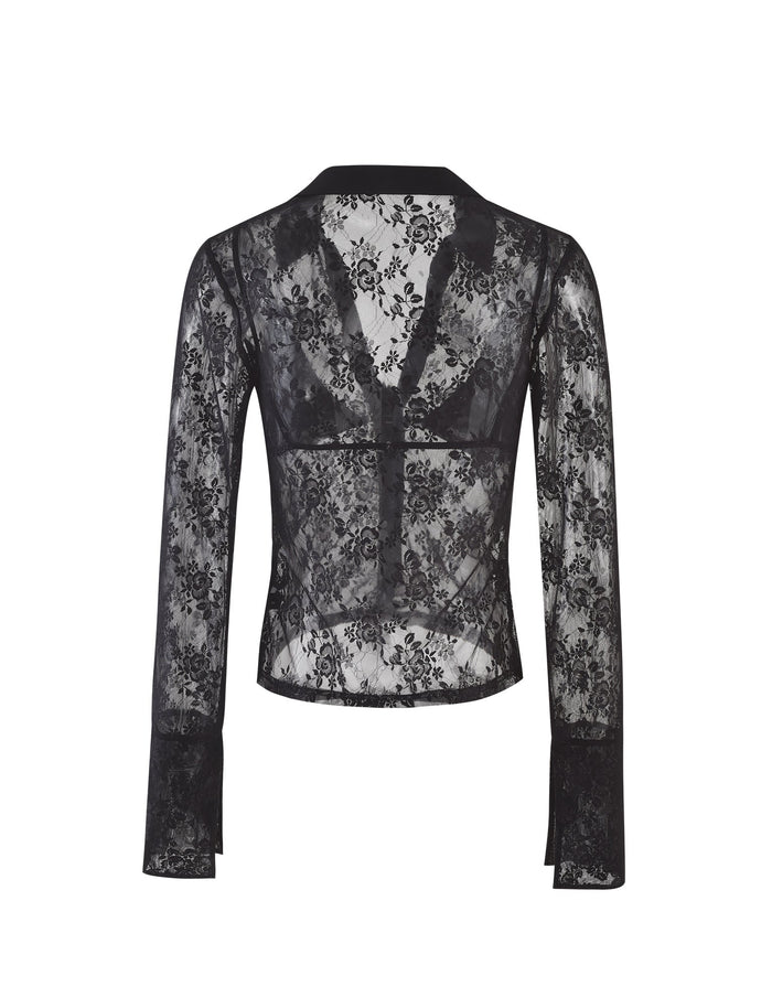 The MIRABEL TOP - BLACK : LACE from TIGERMIST is displayed from the back. This black lace long-sleeve blouse showcases a delicate floral pattern, a collar, and a fitted waist. The sheer fabric reveals part of its inner structure, while the sleeves extend to full length and finish with slightly flared cuffs.