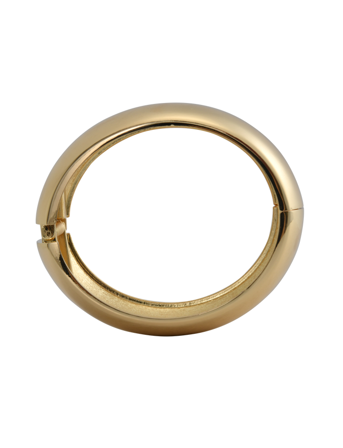 A close-up of a gold hoop earring with a smooth, rounded design and hinged clasp, set against a neutral background—ideal for pairing with the TIGERMIST MIRAH CHUNKY BANGLE - GOLD.
