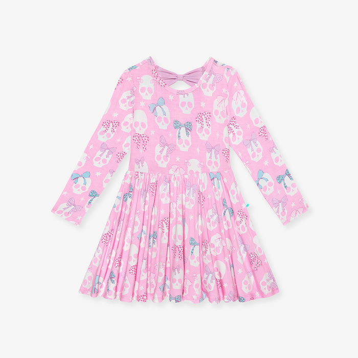 Flat lay of the Posh Peanut Ms. Kelly Bow Back Twirl Dress, front view, white background