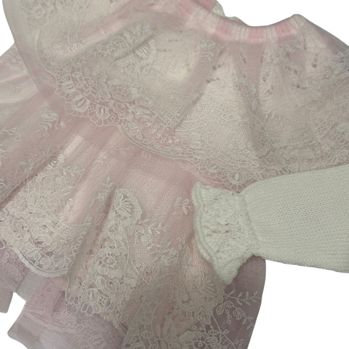 Close-up of layered pink tulle and lace on Sisi Tulle knitted top