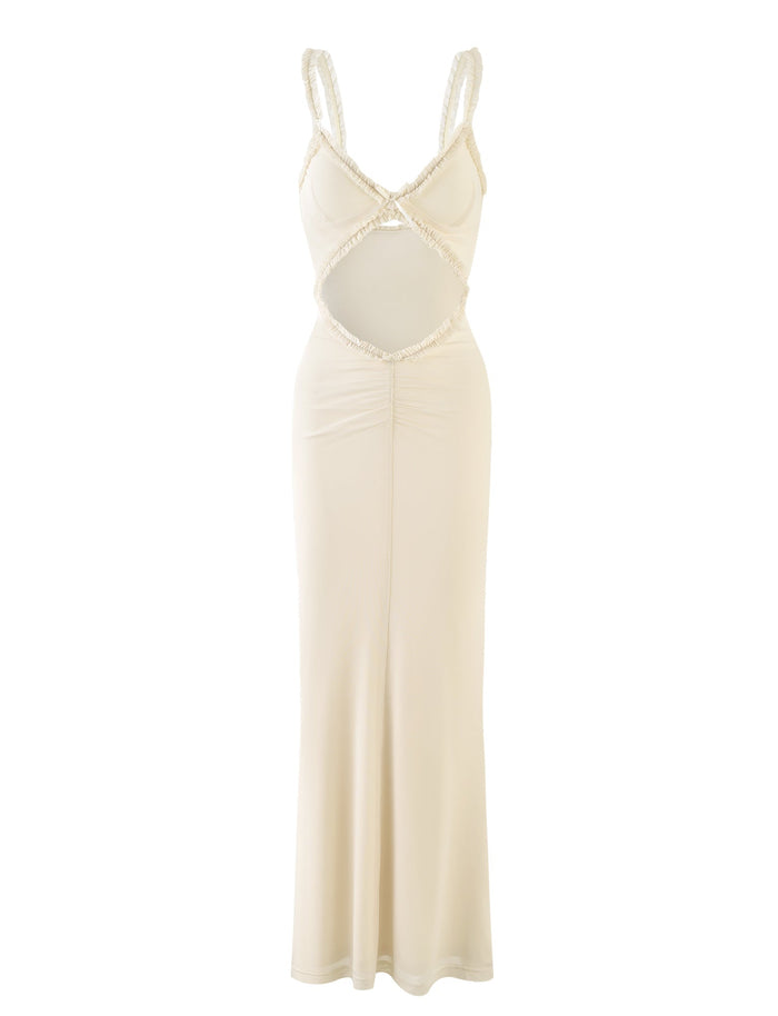 The RAYLA DRESS - WHITE : CREAM by TIGERMIST is a sleeveless, floor-length ivory dress that features a fitted bodice with intricate lace trim, a cut-out section at the midriff, and a flowing skirt. The dress boasts a flattering, elegant design that is perfect for formal occasions.