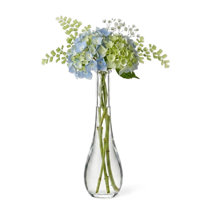 7" Clear Round Teardrop Bud Vase holding blue hydrangea and greenery on a white background