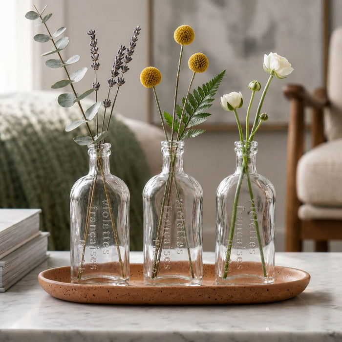Effie Bud Vase set with flowers on a speckled tray