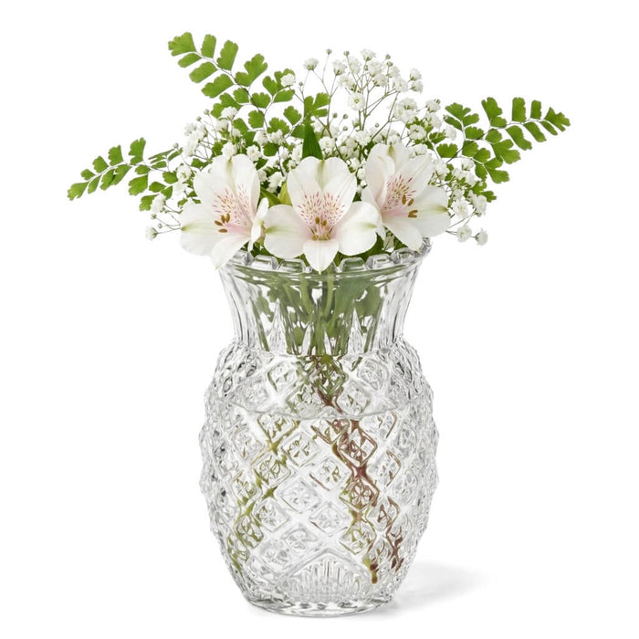 Clear Pineapple Glass Bud Vase filled with alstroemeria and greenery on a white background