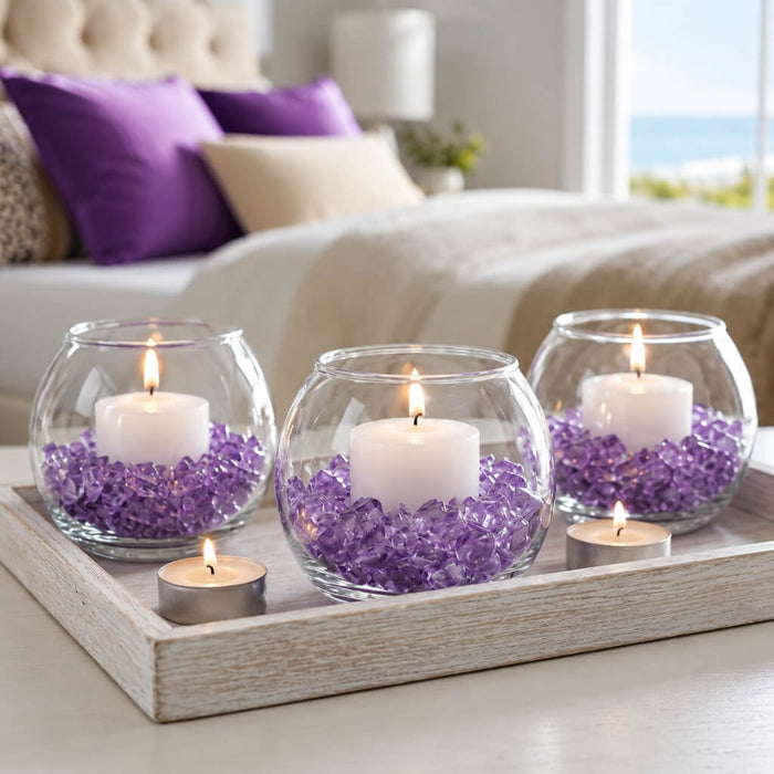 Purple Glass Pebble Vase Filler with candles in fish bowl vases