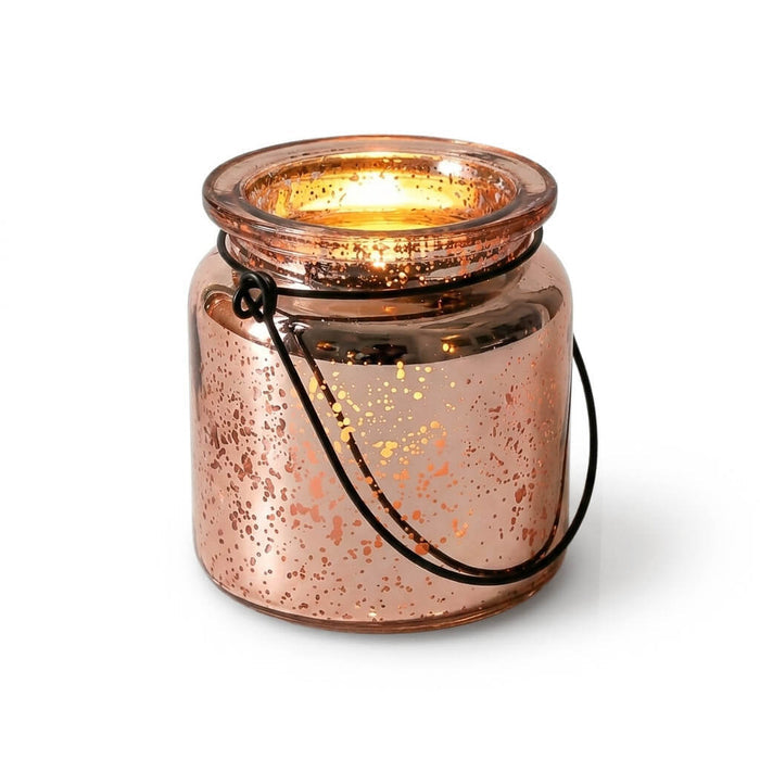 Rose gold mercury hanging candle holder with glowing light on white background