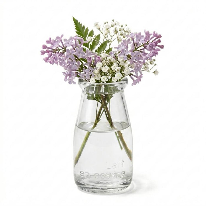 Rhea Bud Vase filled with purple lilac and baby's breath flowers