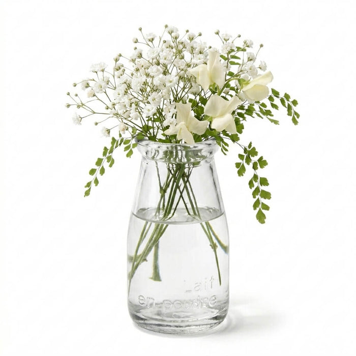 Rhea Bud Vase filled with white baby's breath and sweet peas