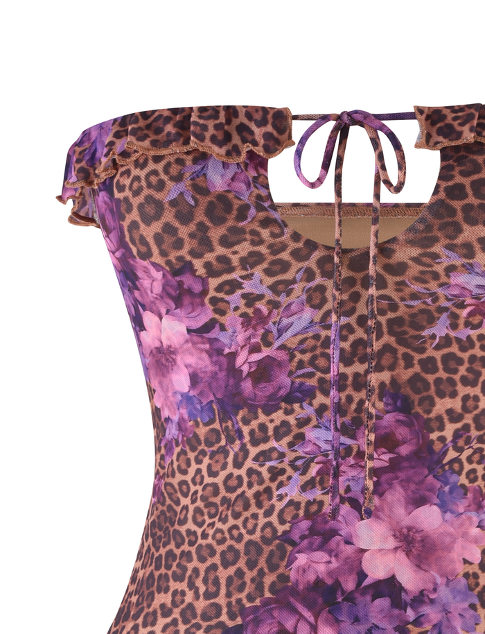 The SIERA TOP - LEOPARD FLORAL by TIGERMIST is a strapless leopard print top with purple floral accents, a tie neckline, and a ruffled top edge.
